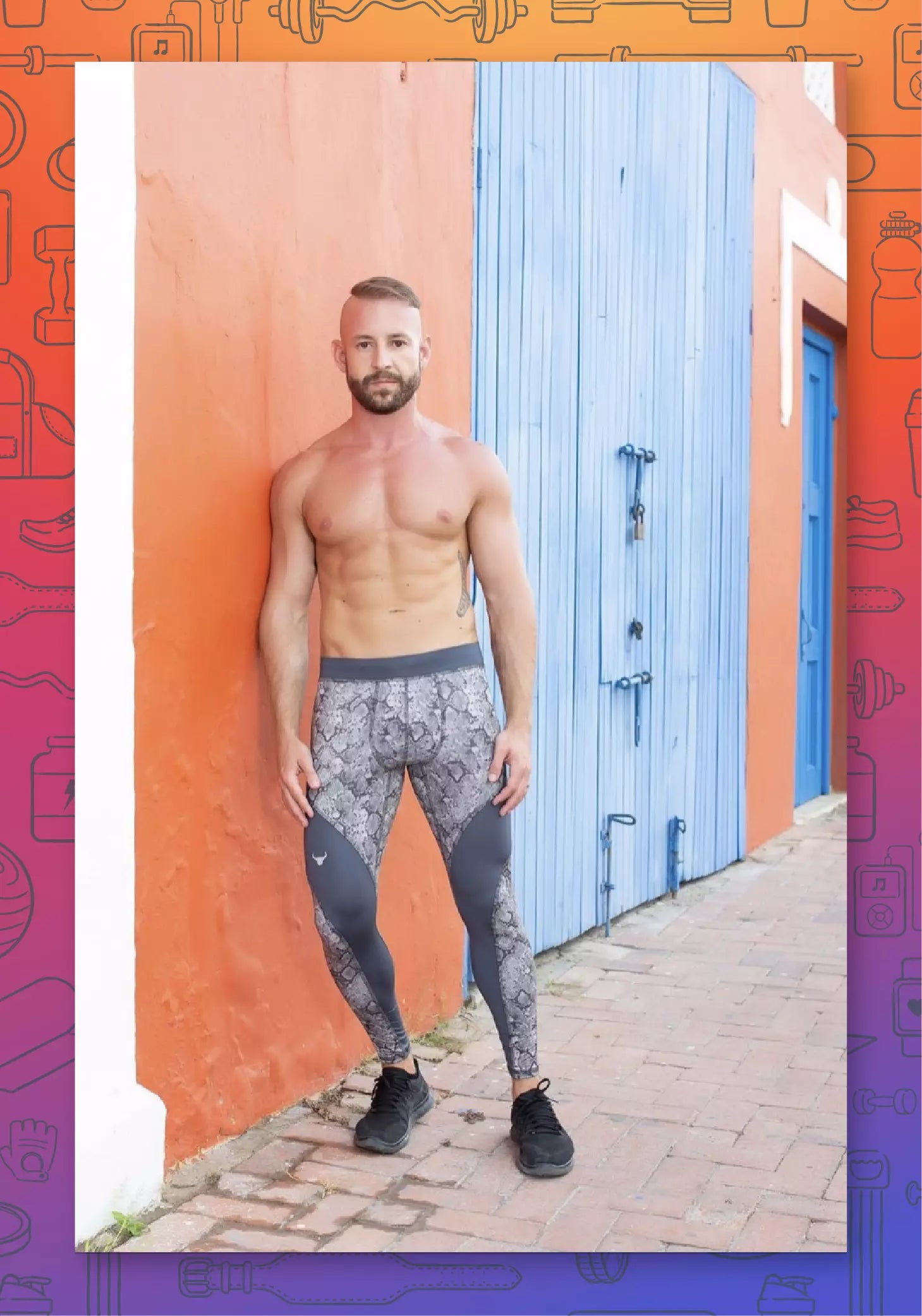 male model wearing men's leggings leaning up against a wall