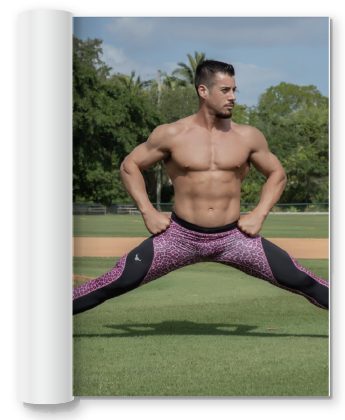 ripped man doing the splits in pink leopard leggings for men