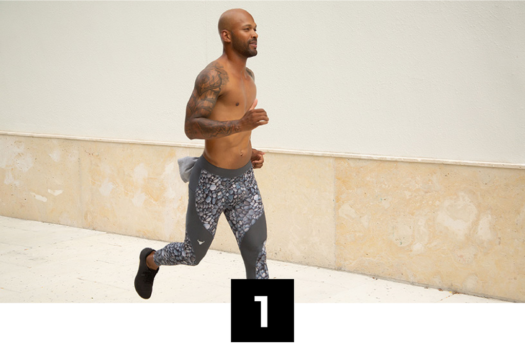 man running with gray printed pebble meggings