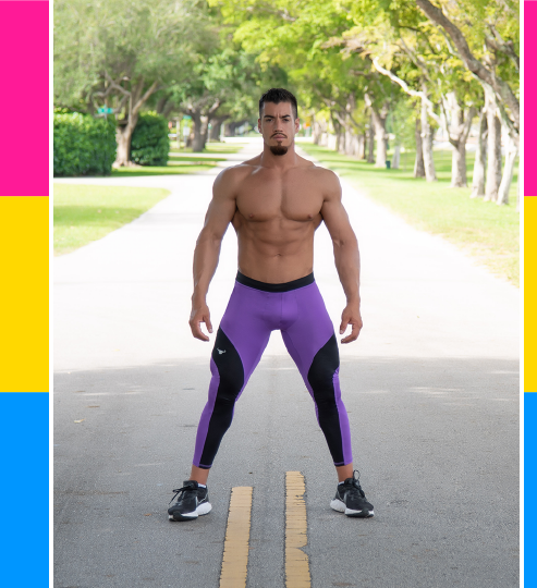 Muscular male model wearing purple and black meggings