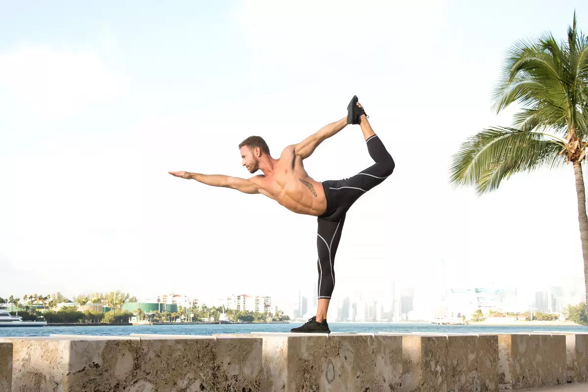 Man performing yoga in Matador Meggings