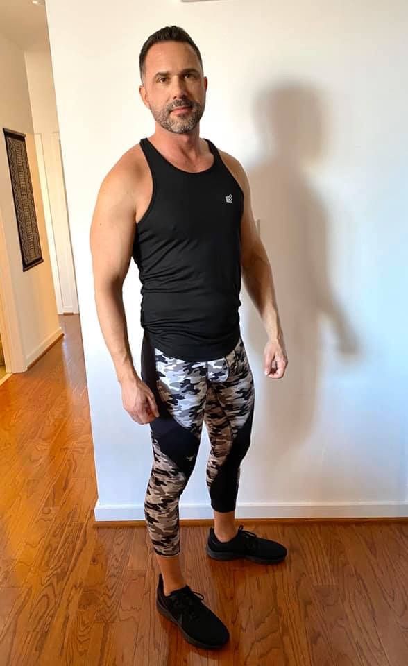 man posing in meggings