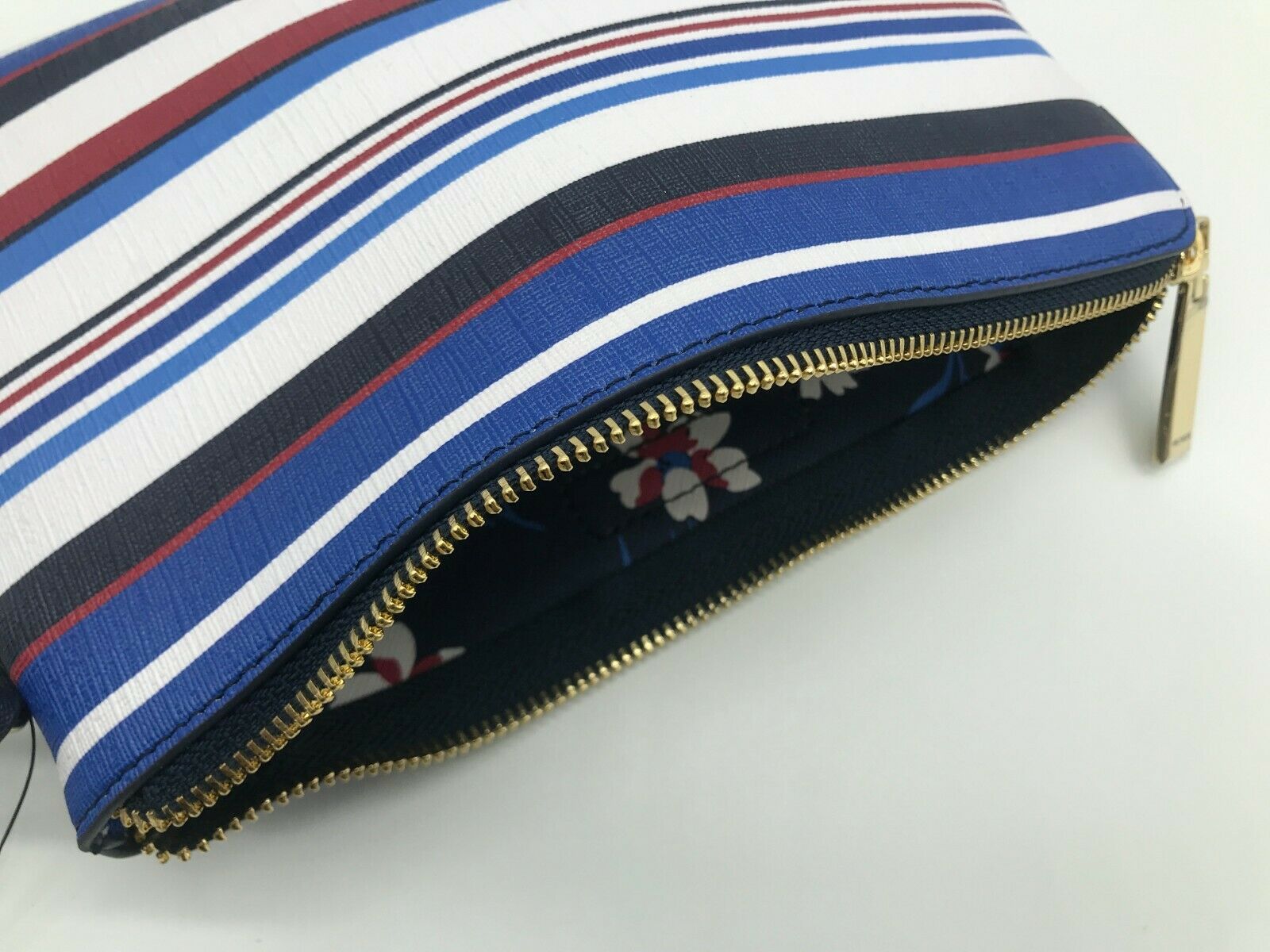 tommy clutch bag