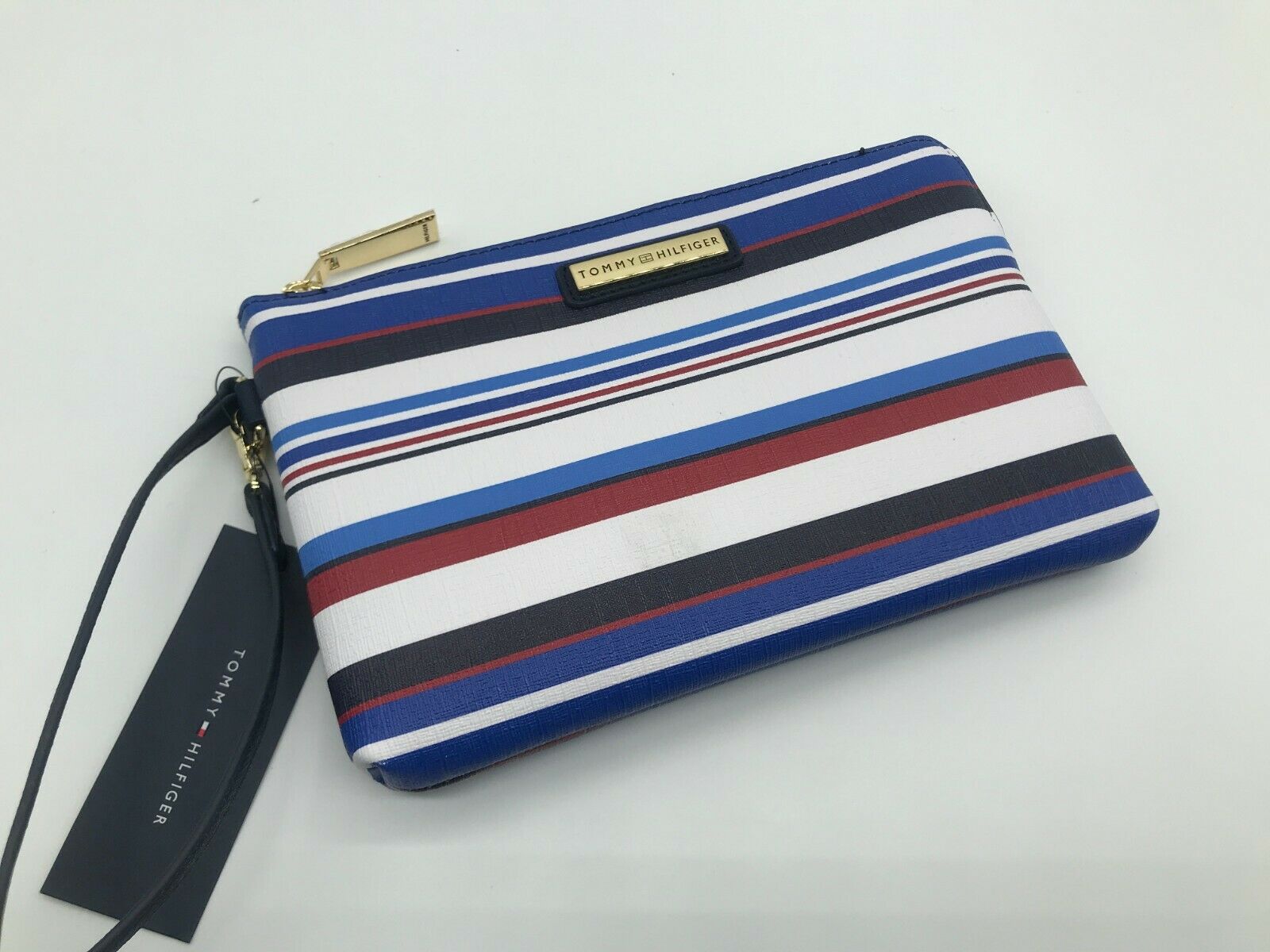 tommy clutch bag