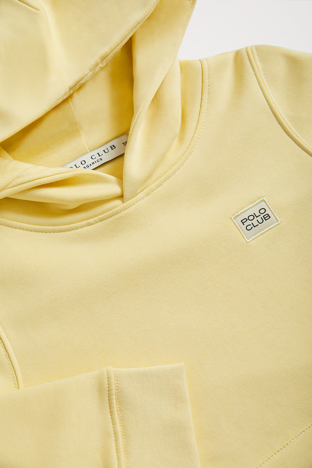Sudadera orgánica de capucha y bolsillos amarilla Neutrals kids con logo