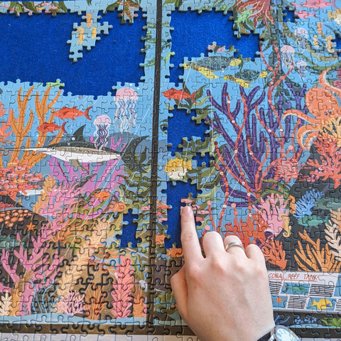 Aquarium jigsaw puzzle piecing together