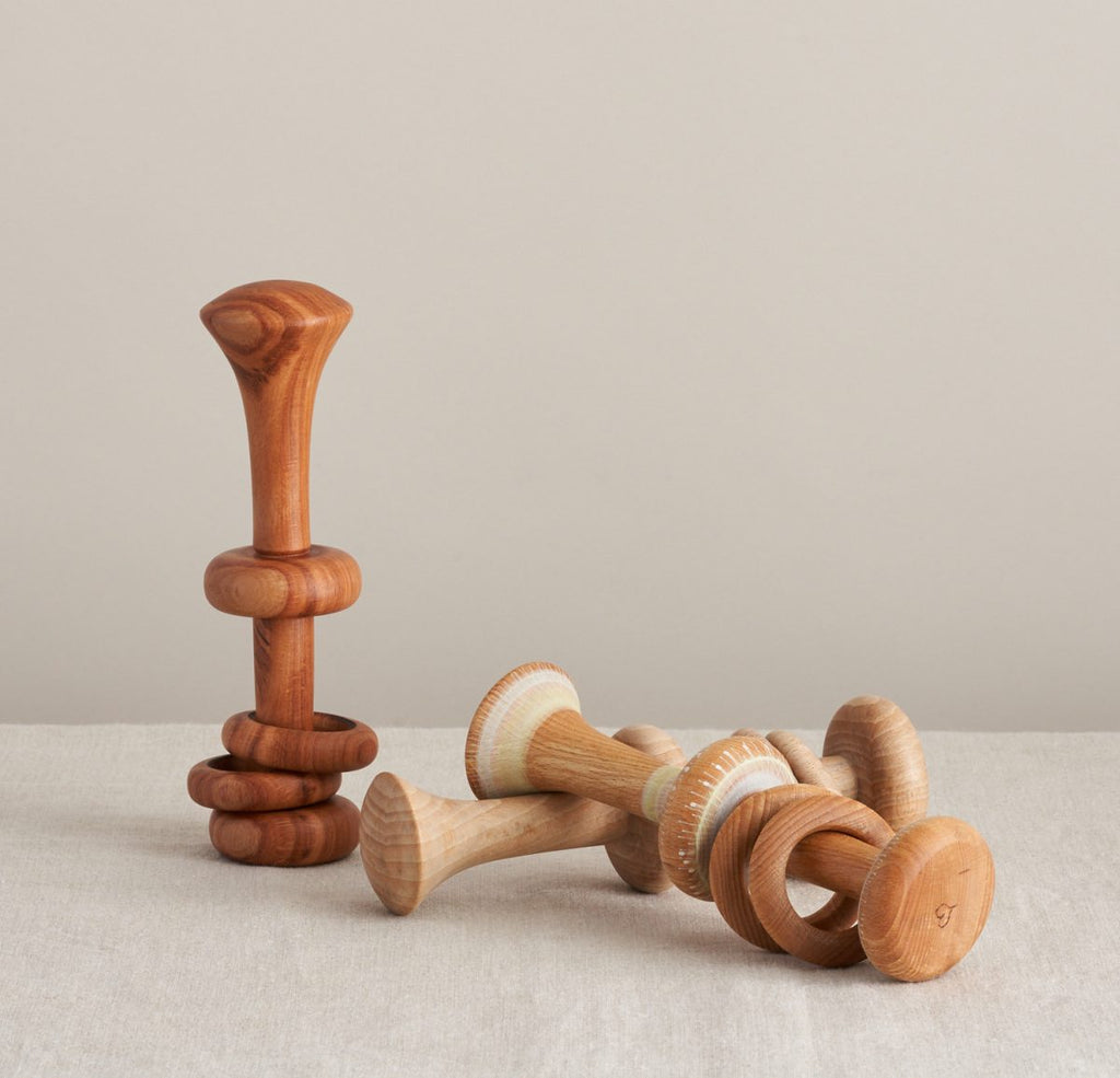 Wooden rattles made by Love Heartwood