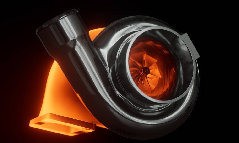 A turbocharger against a black background with an inlet that's glowing hot and an outlet that's cool.