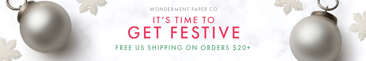 The complete holiday collection by Wonderment Paper Co including Christmas photo cards, greeting cards, gift wrap, and more.