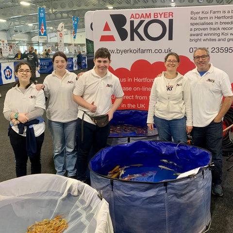 The whole Byer family helping at our stand at the koi show