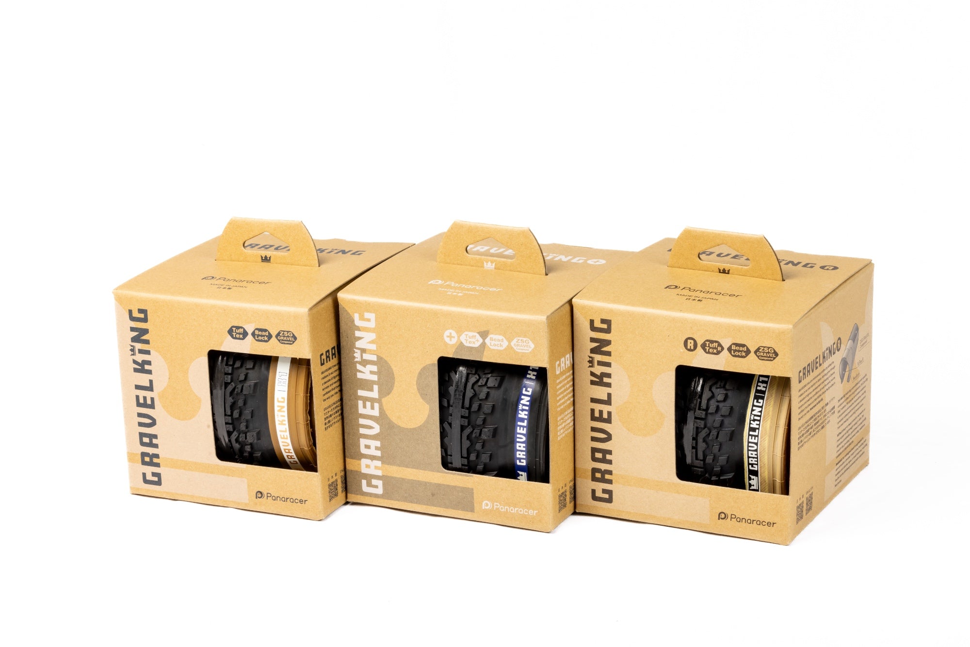 Three Panaracer GravelKing tyres in their boxes