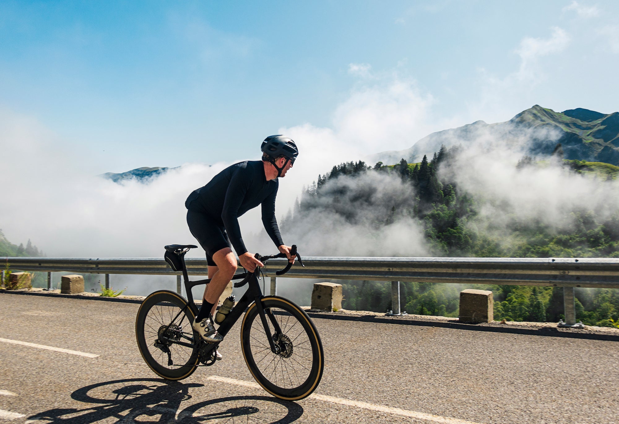 Cyclist on the Col de la Colombiere in the French Alps near Nice, France