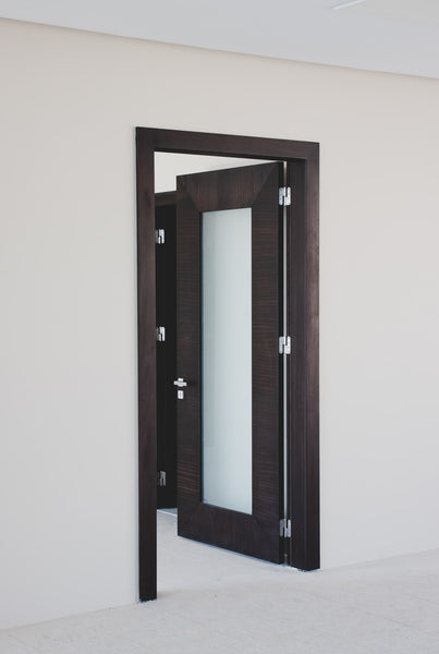 Wooden door with frosted glass panel