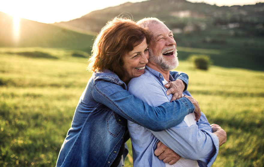 Elder couple Celebrating Life & smiling