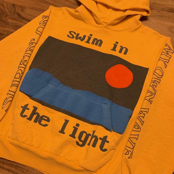 swim in the light sweatshirt