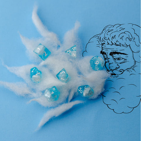 7 piece resin dice set nestled in a cloud being blown from Old Man Winter's mouth.