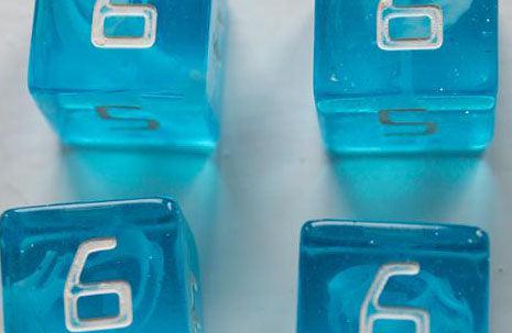 Blue resin dice with low quality inking.