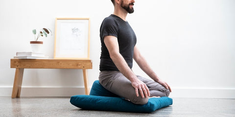 a man in meditation posture