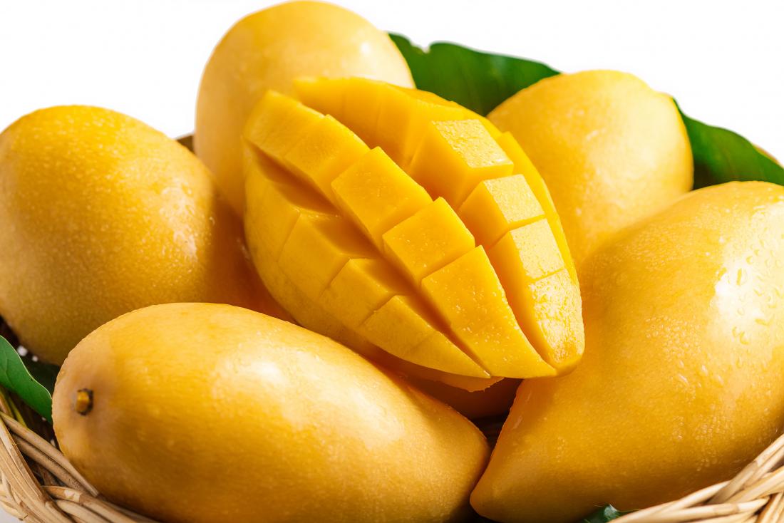 cut up mango for guinea pigs to enjoy
