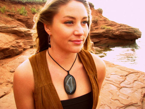 woman wearing sardonyx macrame crystal necklace