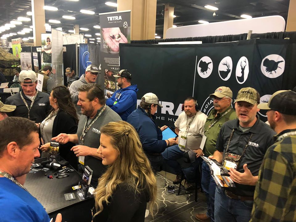 TETRA staff talk to customers at the NWTF show
