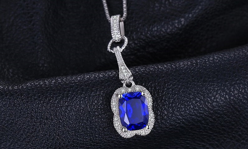 september birthstone necklace pendant with blue sapphire