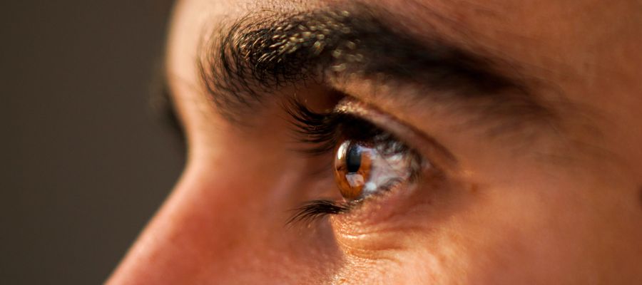 closeup of human eye seen from profile