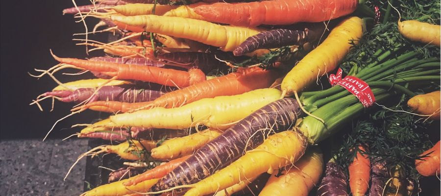 bunch of yellow carrots and other carrot varities