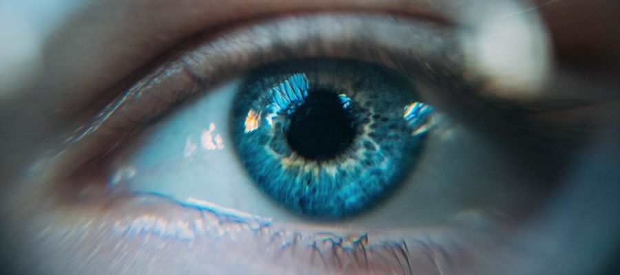 closeup of blurry and watery blue eye