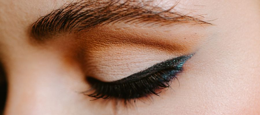 closed eye with mascara and makeup