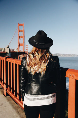 women wearing a leather jacket