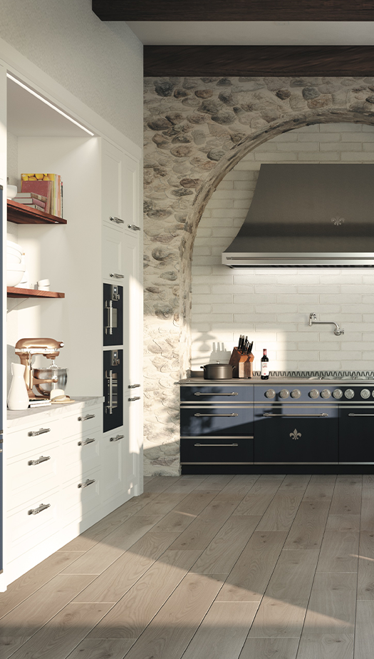 Black Kitchen Cabinets with Silver Hood Above It