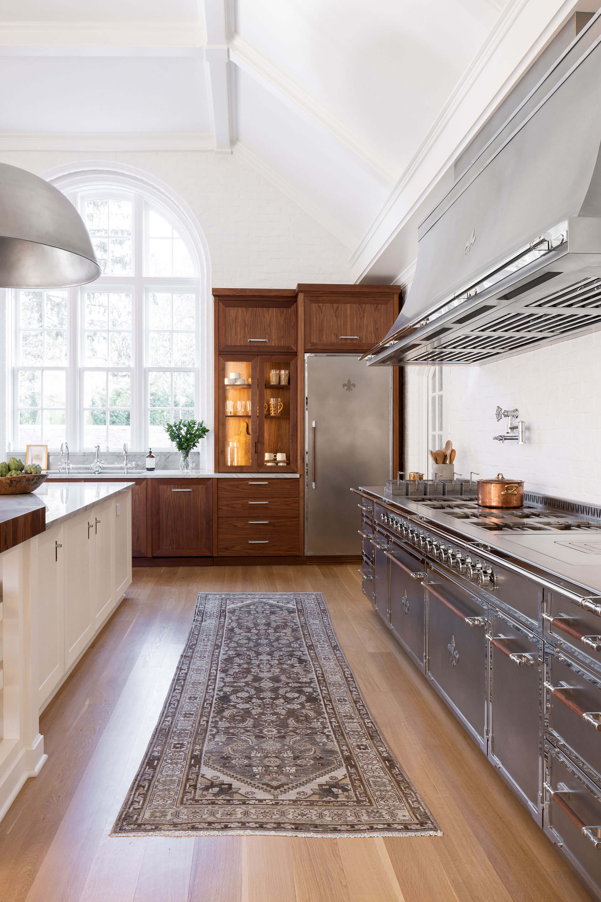 Wooden Kitchen Cabinets with Silver French kitchen Ranges and Hood