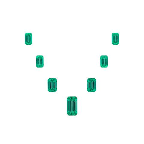 Suite of step-cut emeralds totaling 8.64 carats by Mikola Kukharuk, Nomad’s.