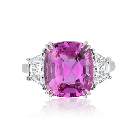 Ring featuring a 7.23-carat cushion-shaped pink sapphire accented with diamonds set in platinum by Joseph Ambalu, Amba Gem Corp.