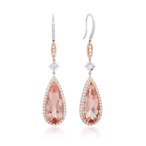 Earrings featuring pear-shaped morganites totaling 19.92 carats accented with diamonds totaling 1.95 carats set in 18-karat rose and white gold by Craig Slavens, Luxe Fine Jewelry.