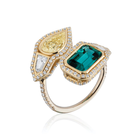 Ring featuring a 2.39-carat untreated blue tourmaline and a 1.03-carat fancy yellow diamond accented with round- and bullet-cut diamonds totaling 1.14 carats set in 18-karat white and yellow gold by Raja Mehta, A. G. Gems, Inc.