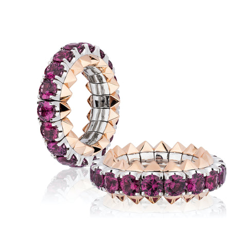 Expandable ring featuring pink rhodolite garnets totaling 5.01 carats set in 18-karat rose and white gold by Tariq Riaz, Tariq Riaz LLC.