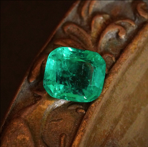 3.2-carat, cushion-shaped, minor oil Colombian emerald