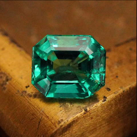 5.11-carat minor oil step-cut Colombian emerald