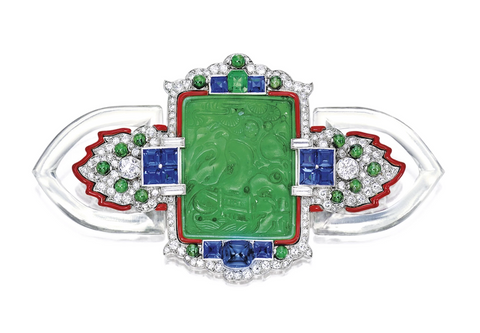 Art Deco brooch featuring jadeite, diamonds, sapphires, emeralds and rock crystal