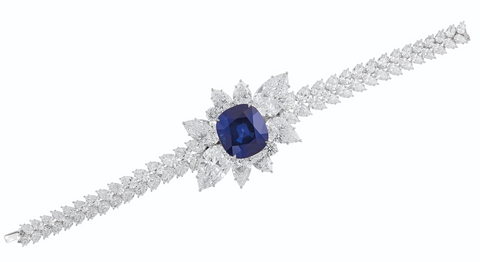 This sapphire and diamond bracelet features a 43.10-carat Kashmir sapphire, certified as an unheated “royal blue” and an approximate age of 21 million years.