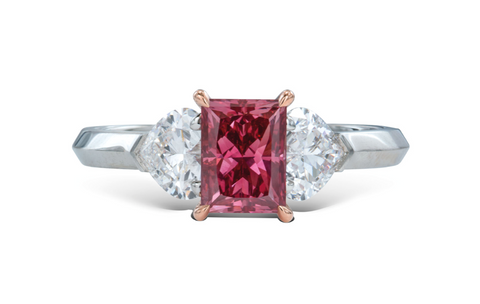This 1.05-carat fancy purplish-red VS2 diamond set in a ring by Graff sold for $2,640,000 per carat at Christie's, setting a new auction record for price per carat.