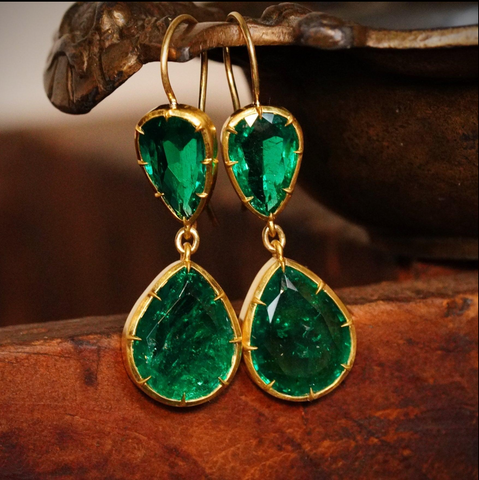 Jogani original earrings featuring Colombian emeralds with minor oil