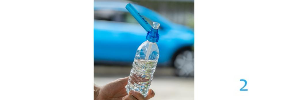 Holding-water-bottle-bong-image