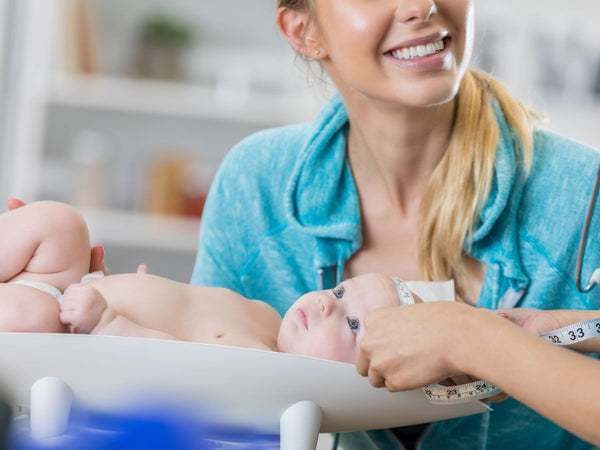 baby being weighed