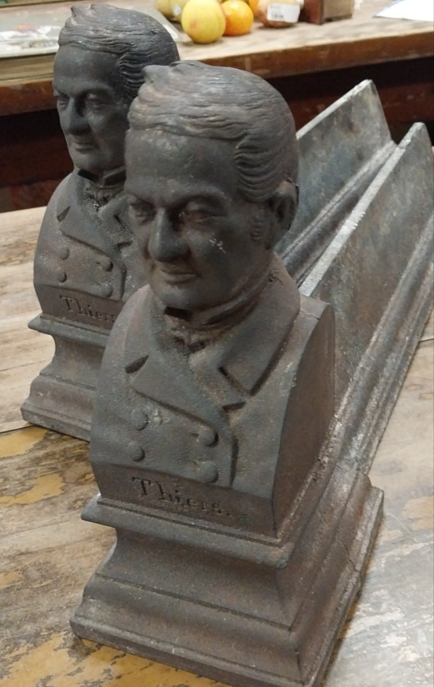 19th Century Cast Iron Man Bust Andirons: A Pair for Your Fireplace