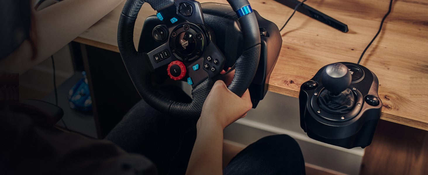 logitech g29 steering wheel fixed on top of table with logitech shifter