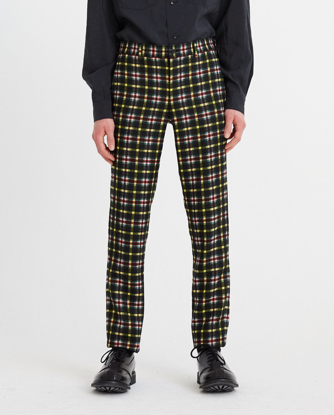 green and black check trousers