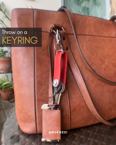 quick handbag styling tip, throw on a keyring